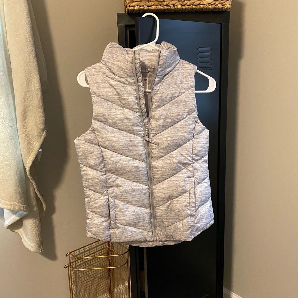 Grey vest — never worn